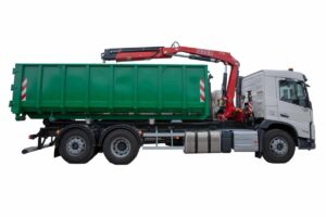 Vehicles for pulling abroll containers