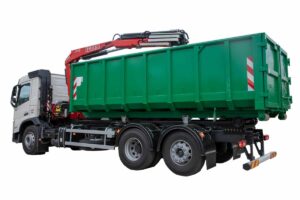 Vehicles for pulling abroll containers